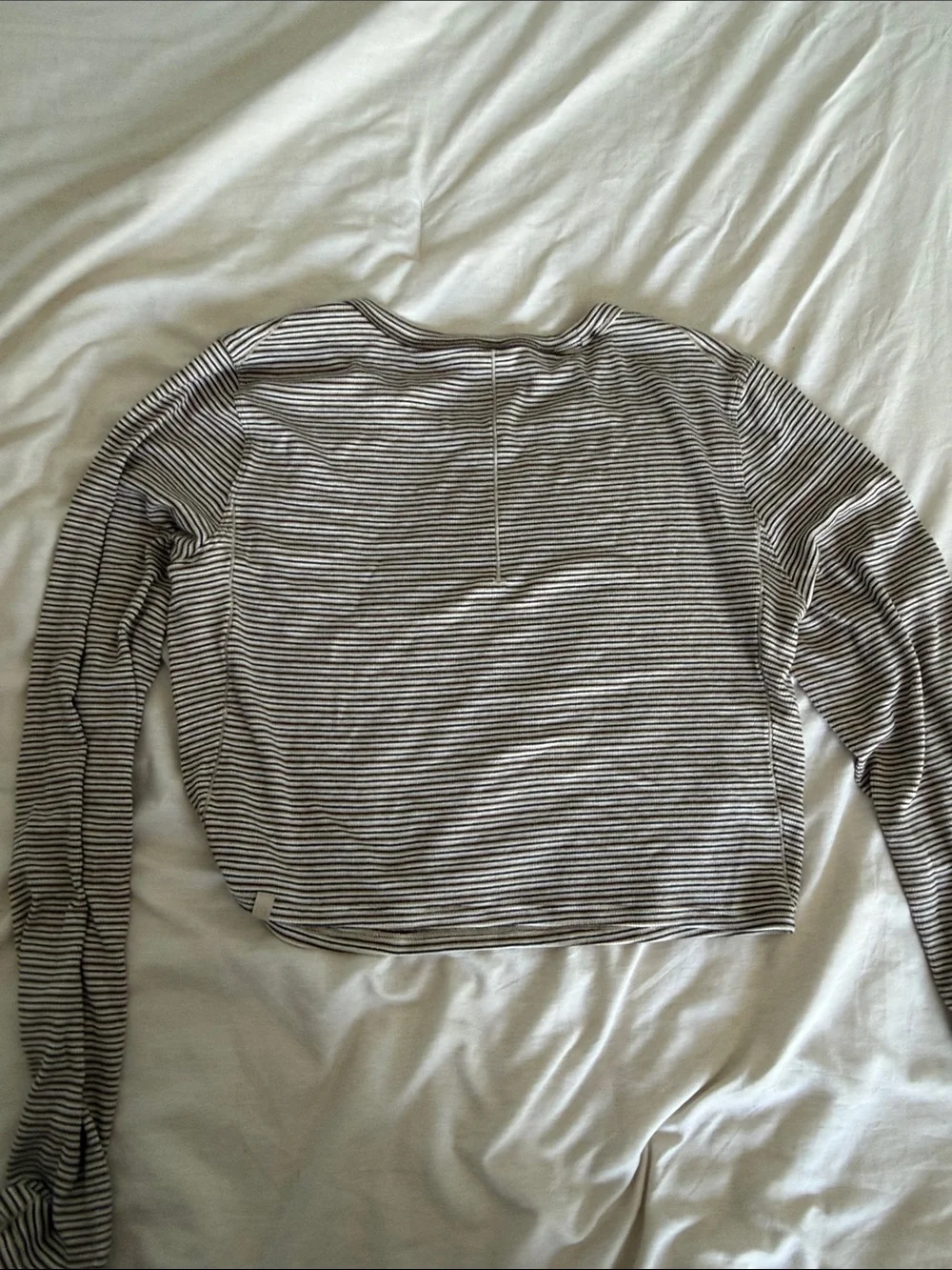 lululemon athletica striped long sleeve crop top in black and white